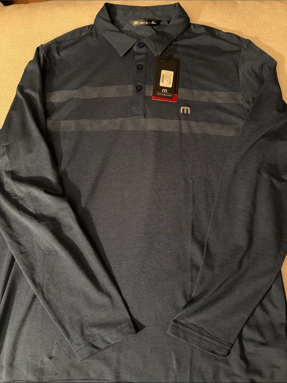 NWT Travis Mathew Men's Long Sleeve Polo in Navy Blue with Subtle Stripe